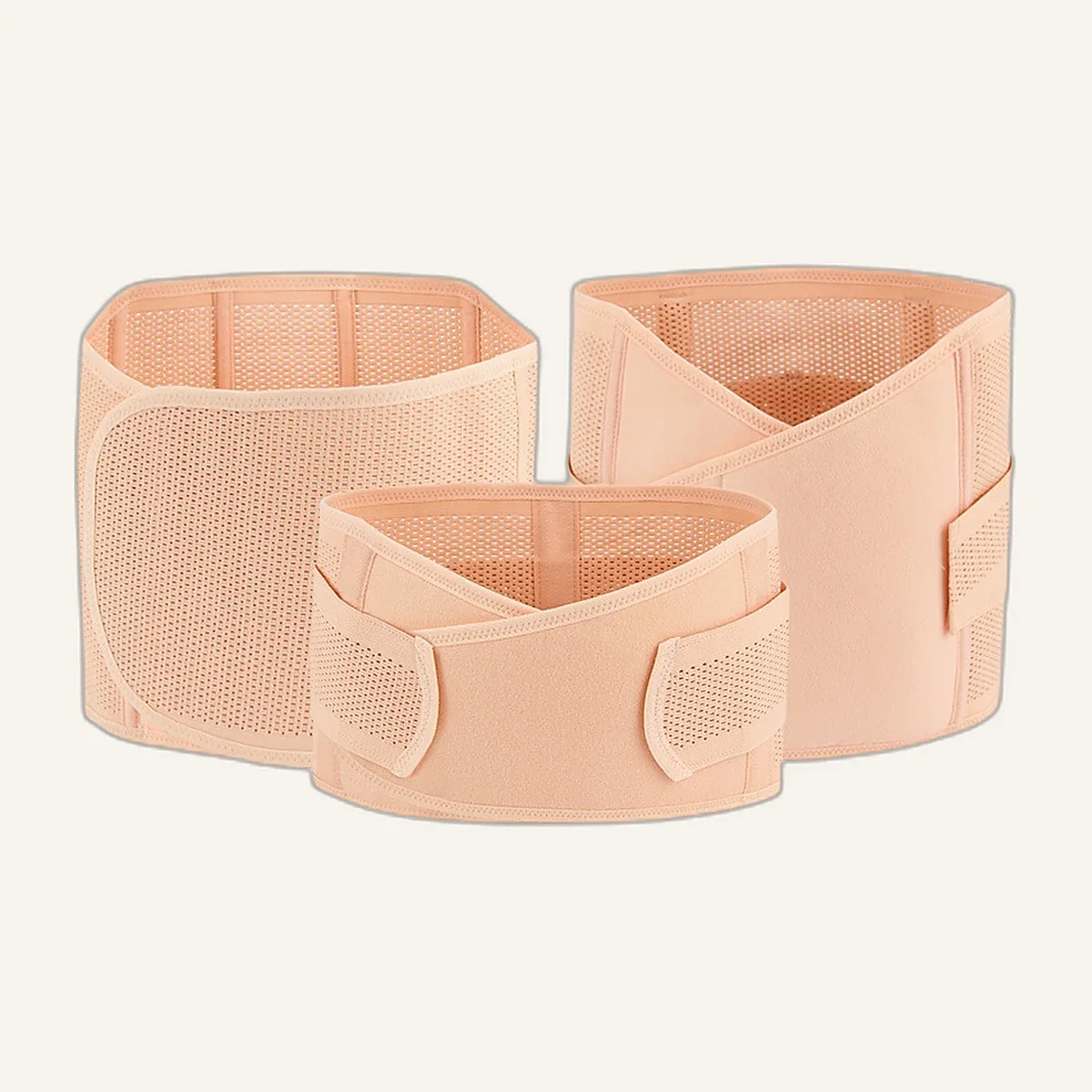 Trois bandes de gaine post-partum couleur chair posées à plat