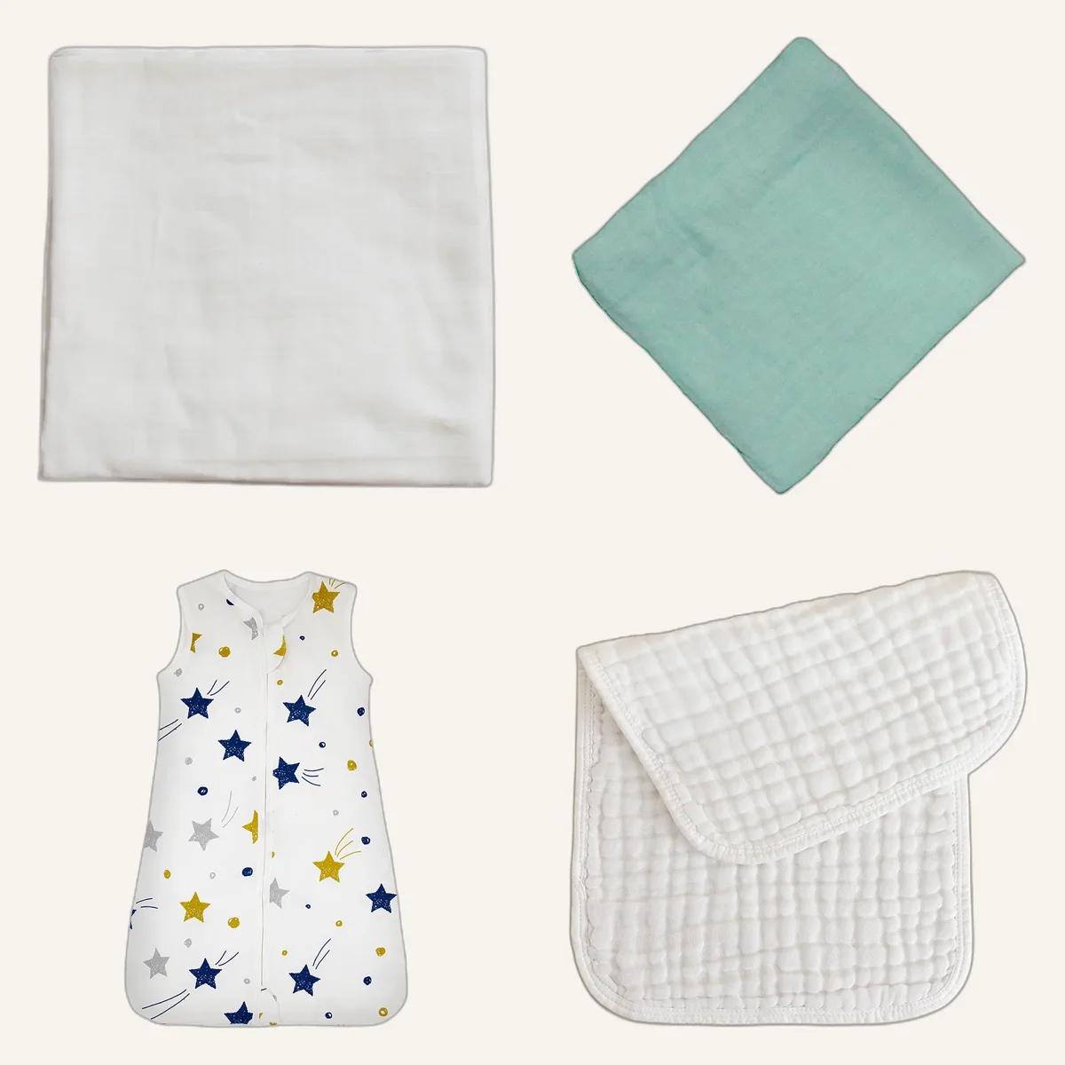 Pack jumeaux : deux langes, deux gigoteuses et six langes en gaze